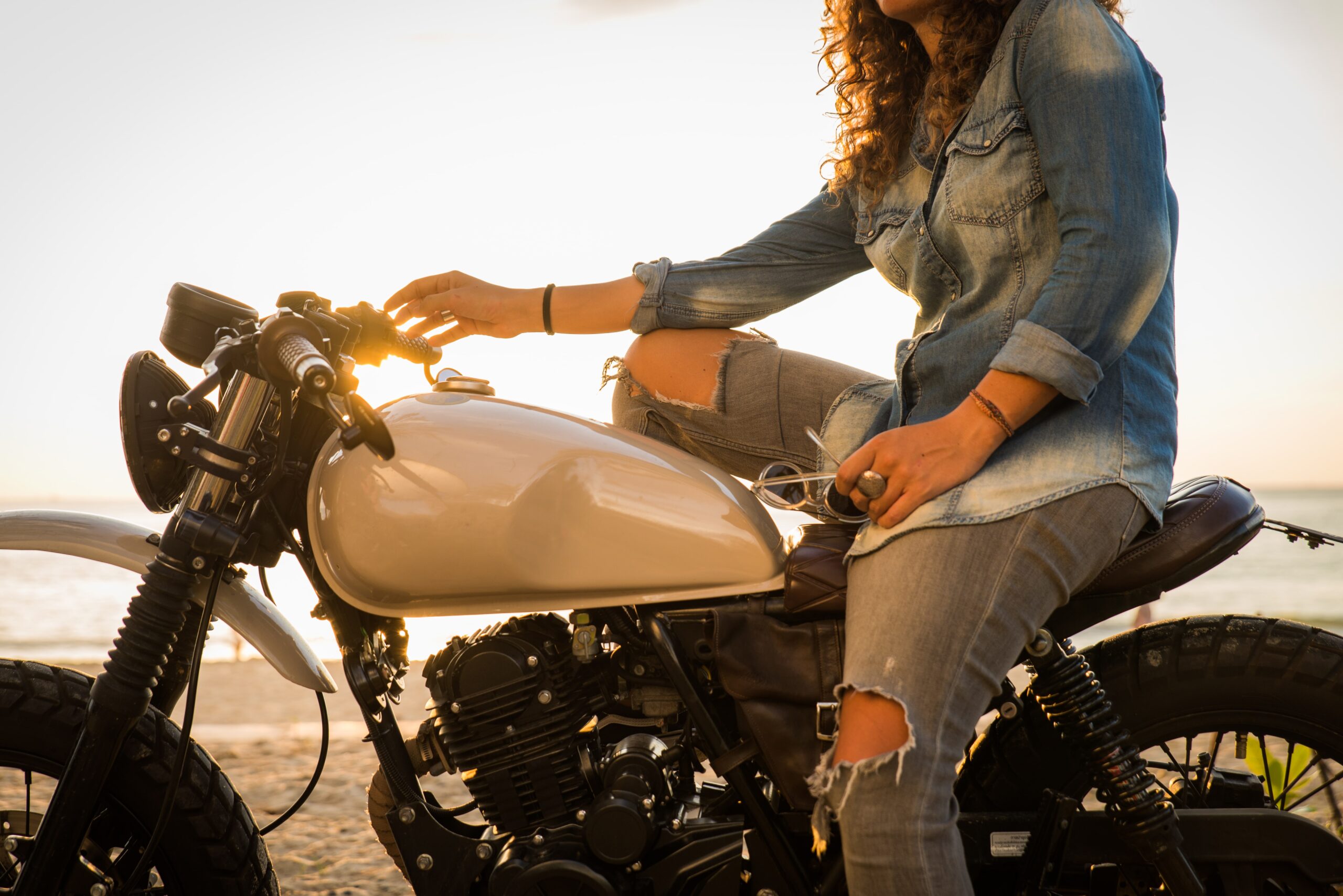 female-biker-driving-a-cafe-racer-motorbike-2025-03-31-07-05-43-utc-min