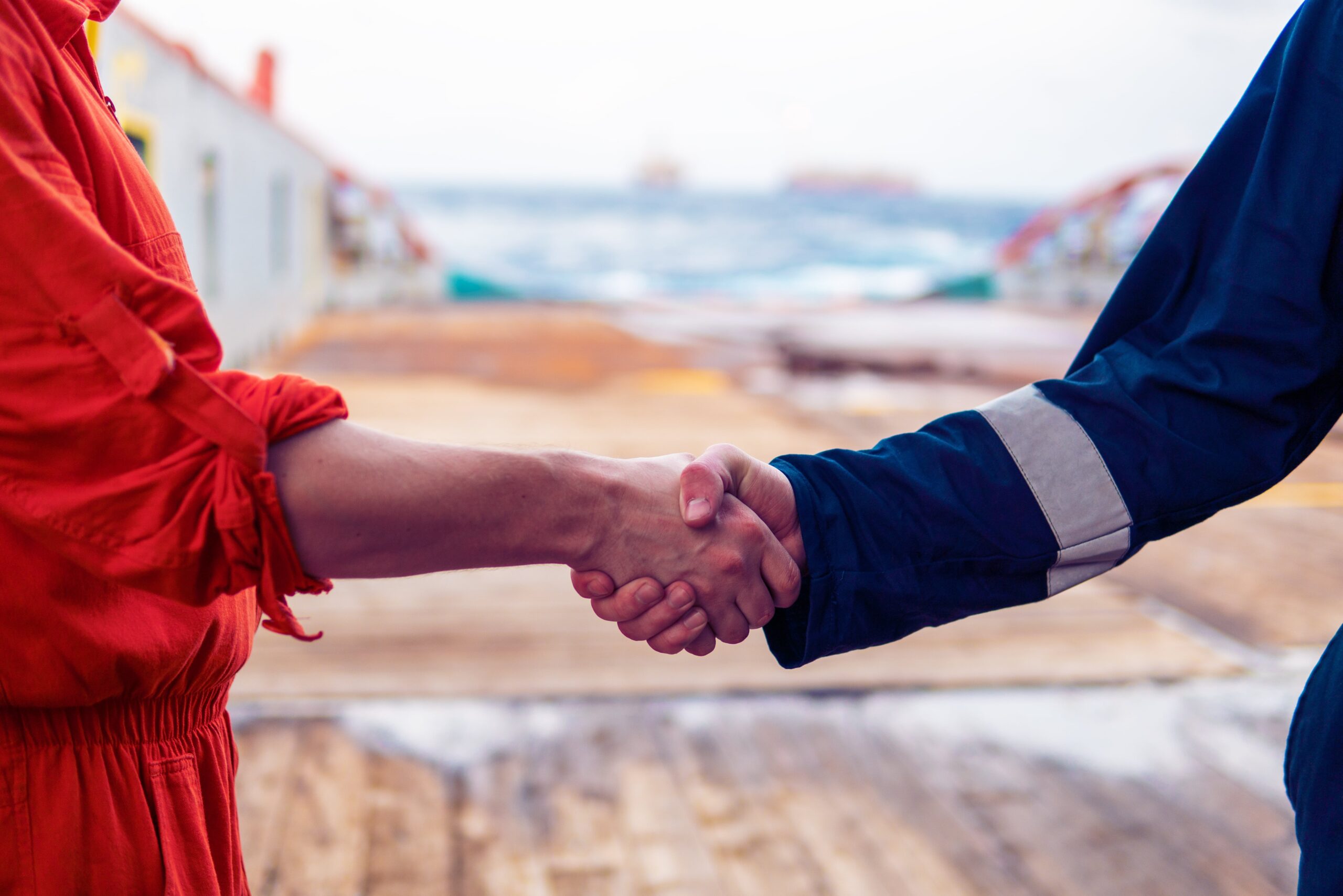 marine-contractor-businessman-handshaking-with-wor-2025-02-12-05-51-31-utc-min