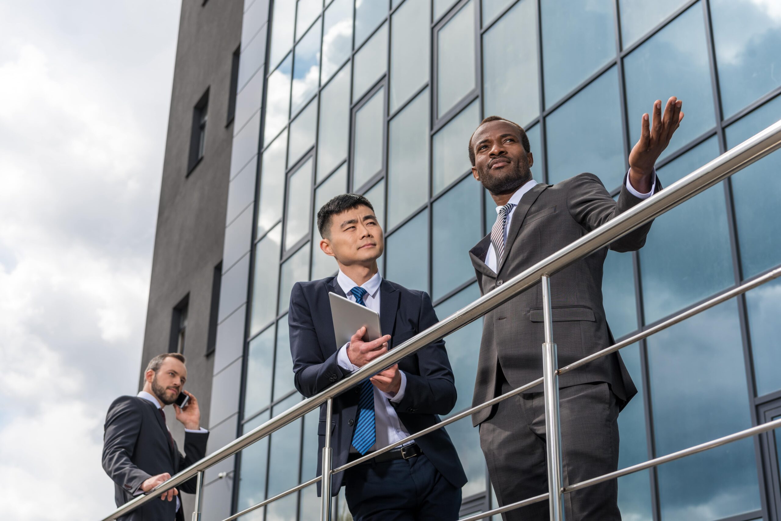 multicultural-business-team-meeting-outdoors-near-2024-11-19-08-26-56-utc-min